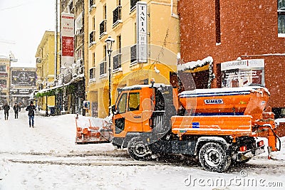 Worker Snow Plow Truck During Heavy Snow Storm In Downtown Bucharest City Editorial Stock Photo