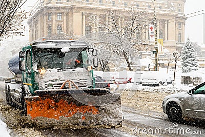 Worker Snow Plow Truck During Heavy Snow Storm In Downtown Bucharest City Editorial Stock Photo