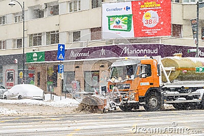 Worker Snow Plow Truck During Heavy Snow Storm In Downtown Bucharest City Editorial Stock Photo