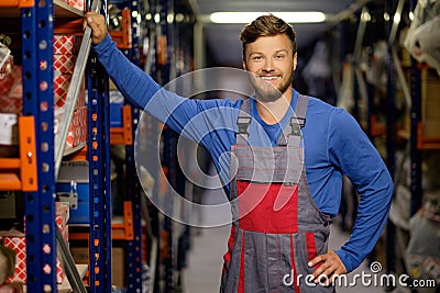 Worker in a spare parts warehouse Stock Photo