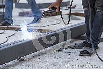 Worker steel welding with unsafety position Stock Photo