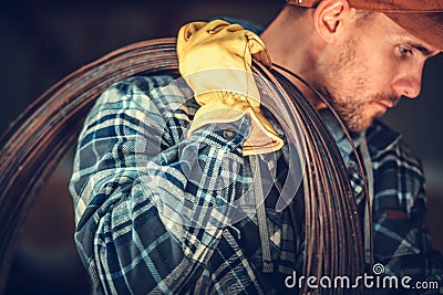 Worker with Steel Wire Stock Photo