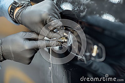 Filming car body at the vehicle service Stock Photo