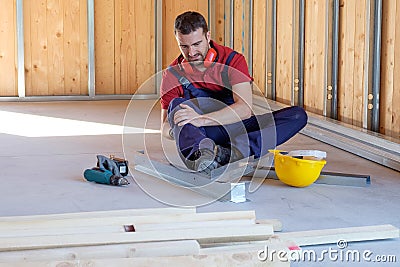 Worker suffering after on-the-job injury Stock Photo