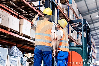 Worker team taking in logistics warehouse Stock Photo