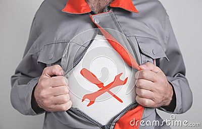 Worker tearing his shirt. Technical Support Customer Service Stock Photo