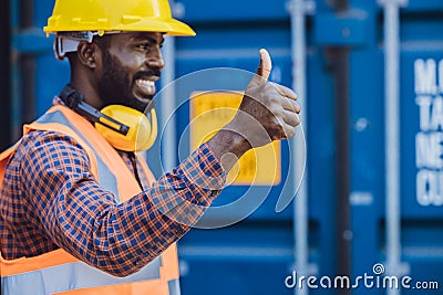 Worker thumbs up hand sign good job best working approved, selective focus at hand Stock Photo