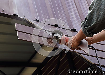 Worker use small grinding tool Stock Photo