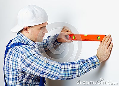 Worker using spirit level Stock Photo