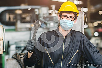 Worker wear disposable face mask for protection Corona Virus Spreading and Smoke dust air pollution filter in factory for healthy Stock Photo