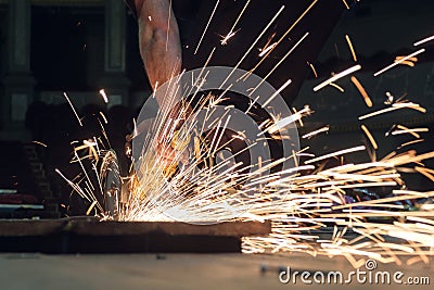 Worker working with a circular grinder Stock Photo