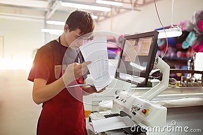 Worker working in fabric industry Stock Photo