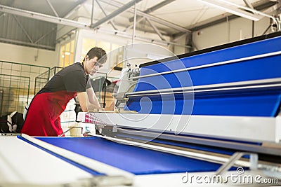 Worker working in fabric industry Stock Photo