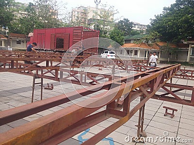 Workers are building a stage frame for the third temple fair on the third day of the third lunar month. In shenzhen xixiang, China Editorial Stock Photo