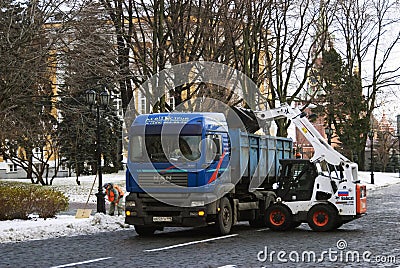 Workers clean Moscow Kremlin after snowstorm. Editorial Stock Photo