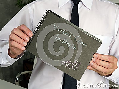 Workers' Comp In-Depth sign on the piece of paper Stock Photo