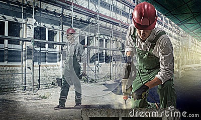 Workers at a construction site Stock Photo