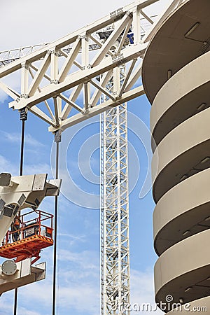 Workers on a construction site. Engineering and architectural infrastructure. Safety Stock Photo