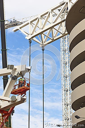 Workers on a construction site. Engineering and architectural infrastructure. Safety Stock Photo