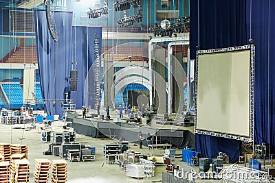 Workers dismantle stage and stage equipment Editorial Stock Photo