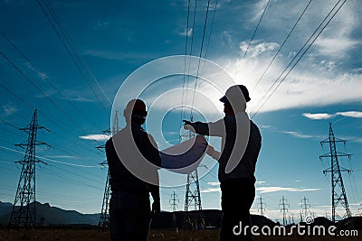 Workers a electricity station Stock Photo