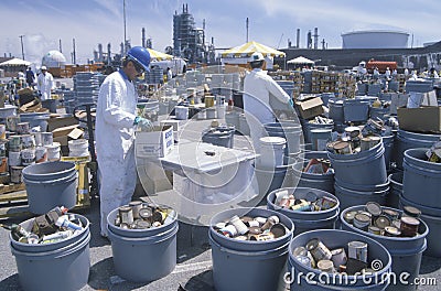 Workers handling toxic household wastes Editorial Stock Photo