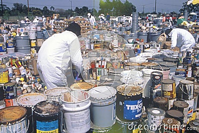 Workers handling toxic household wastes Editorial Stock Photo