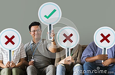 Workers holding a vote sign Stock Photo