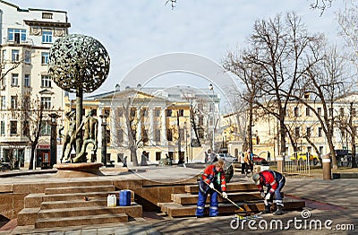 Workers are painting the fountain Adam and Eve. Moscow, Russia. Editorial Stock Photo