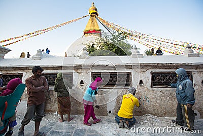 Workers repairing of Stupa Boudhanath, in Kathmandu, Nepal. Editorial Stock Photo