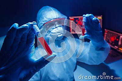 Workers scientist biological laboratory analyzes virus strain model of MERS-Cov coronavirus 2019-nCoV. Blue background Stock Photo