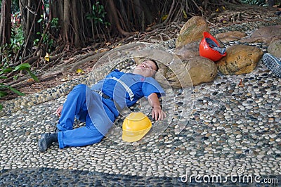 Workers are sleeping under the tree. Editorial Stock Photo