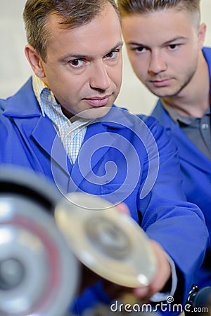 workers using circular blades Stock Photo
