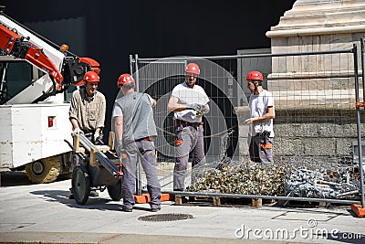 Workers on walls of Duomo di Milan Editorial Stock Photo