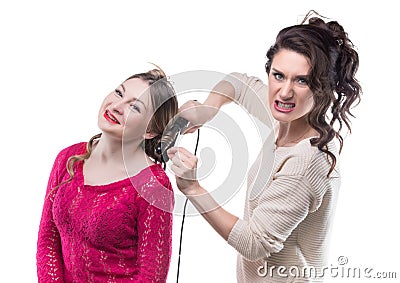 Working angry hairstylist and woman Stock Photo