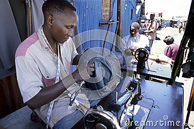 Working as a tailor in Kenyan slum in Nairobi Editorial Stock Photo