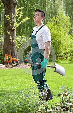Working asian gardener Stock Photo