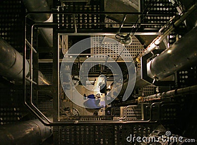 Working at the bottom of a LNG tanker Stock Photo