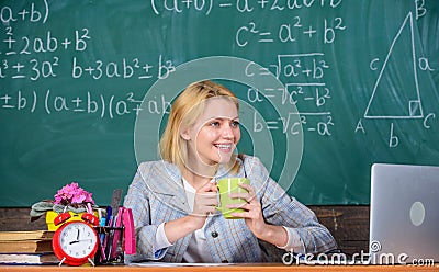 Working conditions which prospective teachers must consider. Working conditions for teachers. Woman smiling teacher Stock Photo