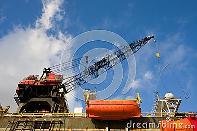 Working crane of an oil rig Stock Photo