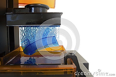Working 3D printer. Electronic three dimensional printing machine in process Stock Photo