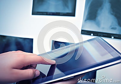 Working with digital tablet in radiology Stock Photo