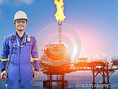 Working engineer at offshore oil and gas refinery Stock Photo