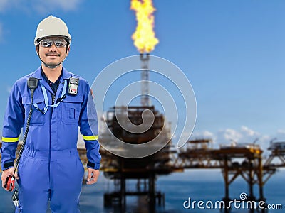 Working engineer at offshore oil and gas refinery Stock Photo