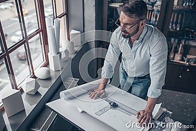 Working engineer with a project Stock Photo