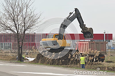 Excavator. Machinery, activity. Editorial Stock Photo
