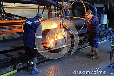 Working in a foundry Editorial Stock Photo