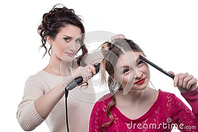 Working hairstylist and client Stock Photo