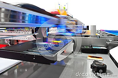 Working industrial large format UV inkjet printer Stock Photo