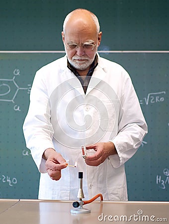 Working in a laboratory with a Bunsen burner Stock Photo